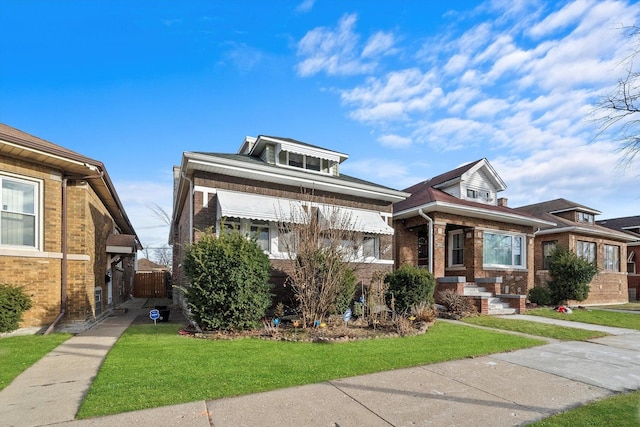 view of front of property with a front lawn