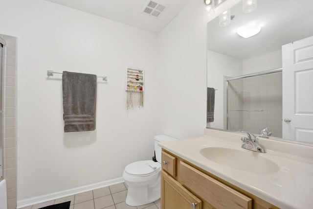 bathroom with toilet, walk in shower, vanity, and tile patterned flooring