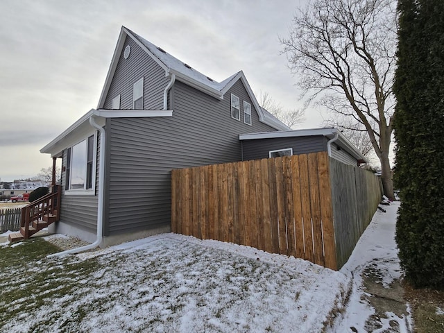 view of snow covered property