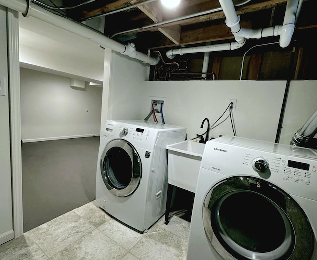 laundry room featuring washing machine and dryer