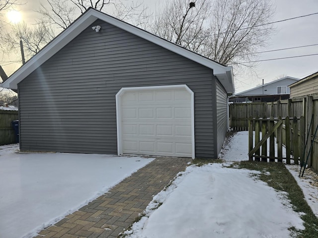 view of snow covered garage