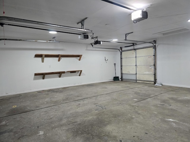 garage featuring a garage door opener