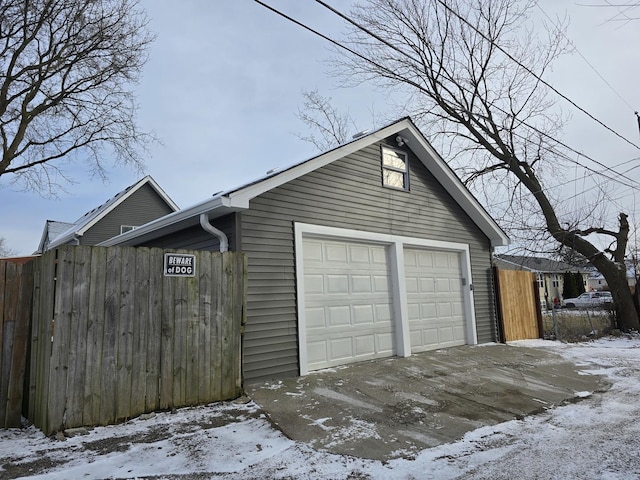 view of snow covered garage