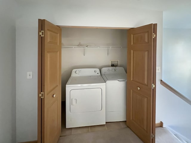 washroom with washing machine and dryer