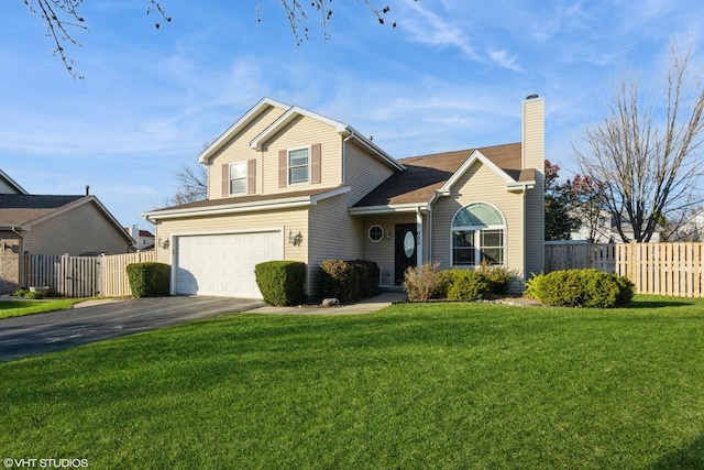 view of front property featuring a garage and a front lawn