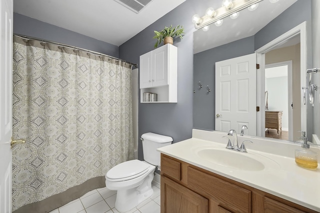 bathroom with vanity, a shower with shower curtain, tile patterned floors, and toilet