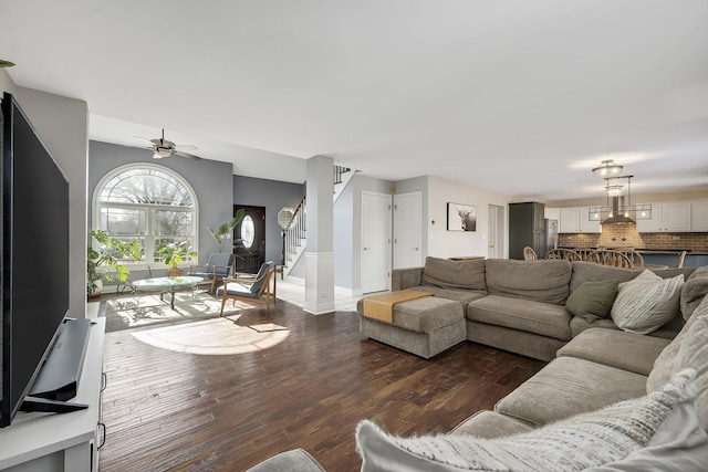 living room with dark hardwood / wood-style flooring