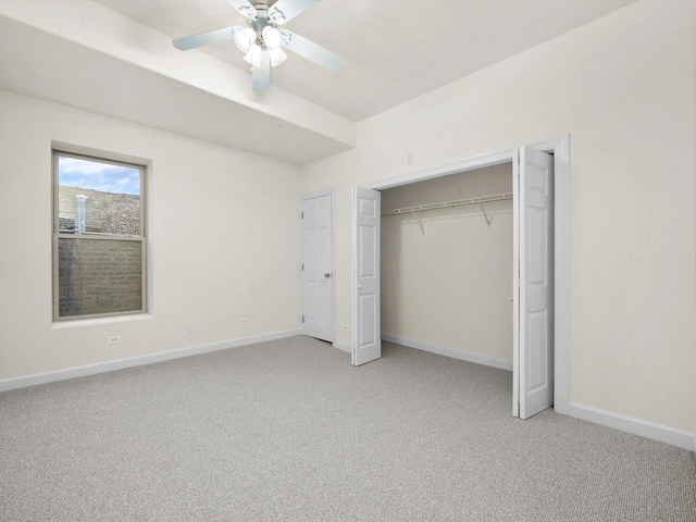 unfurnished bedroom featuring ceiling fan and light carpet