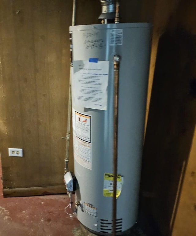 utility room with water heater