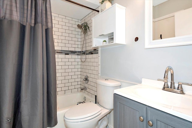 full bathroom featuring toilet, shower / tub combo with curtain, and vanity