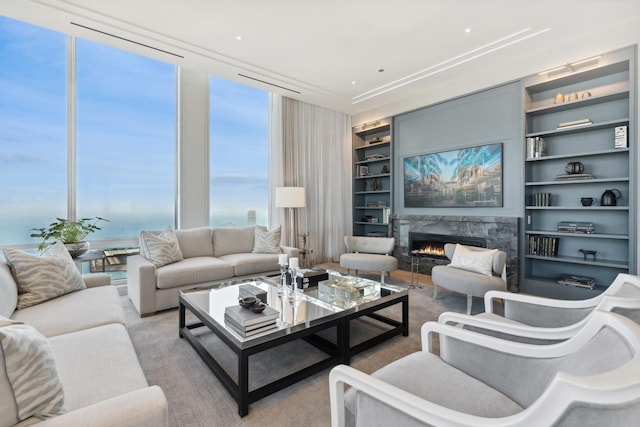 14 W Superior St Unit 6900, Chicago, IL 60654 - living room featuring a high end fireplace and built in features