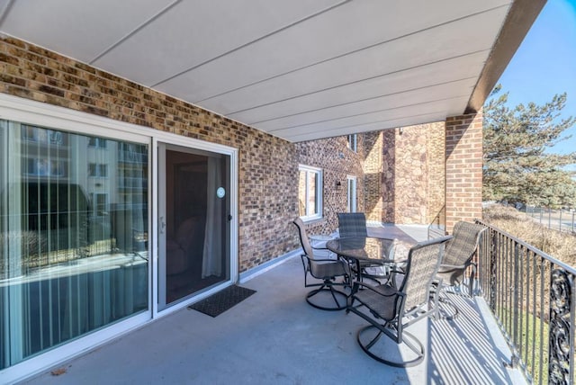 view of patio / terrace with a balcony