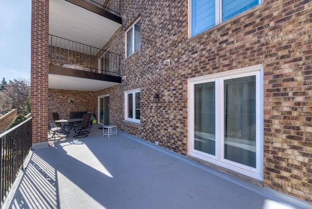 view of patio / terrace featuring a balcony