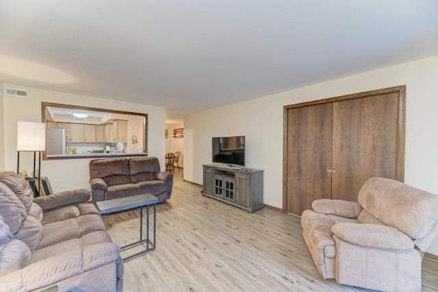 living room featuring light hardwood / wood-style flooring