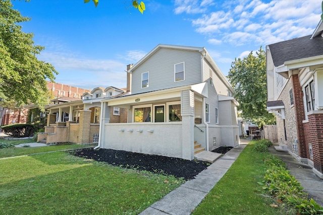 view of front of home featuring a front lawn