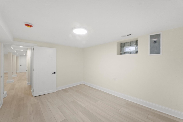 basement with light wood-type flooring