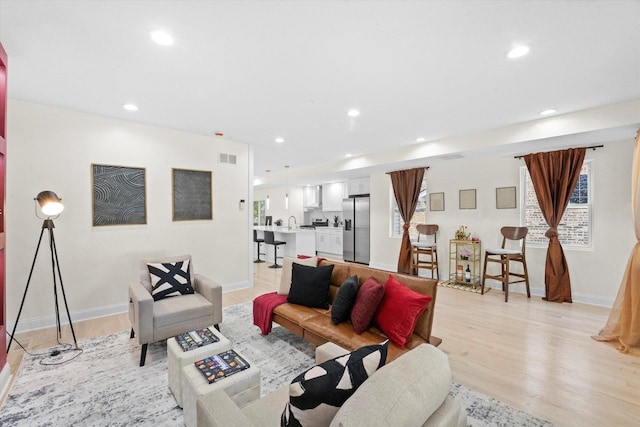 living room with light wood-type flooring