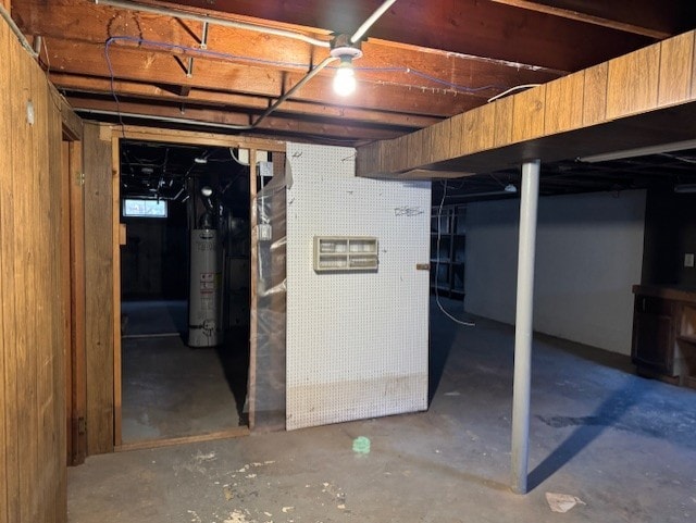 basement featuring gas water heater