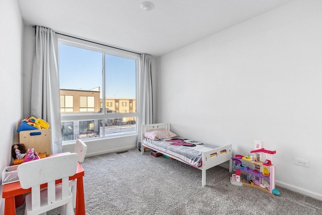 bedroom featuring carpet flooring