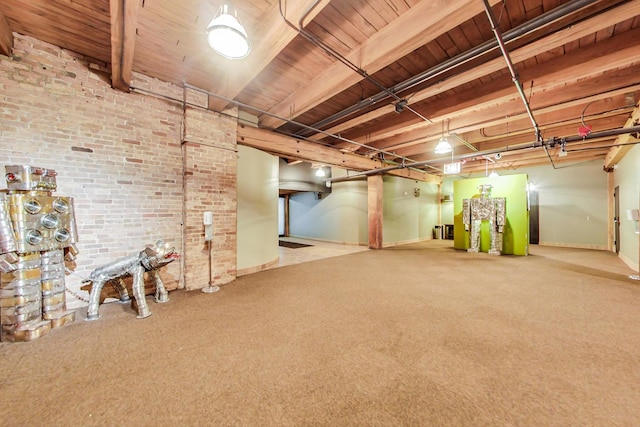 basement with carpet floors, brick wall, and wooden ceiling