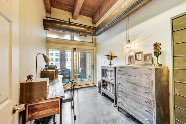 miscellaneous room featuring wood ceiling and beamed ceiling