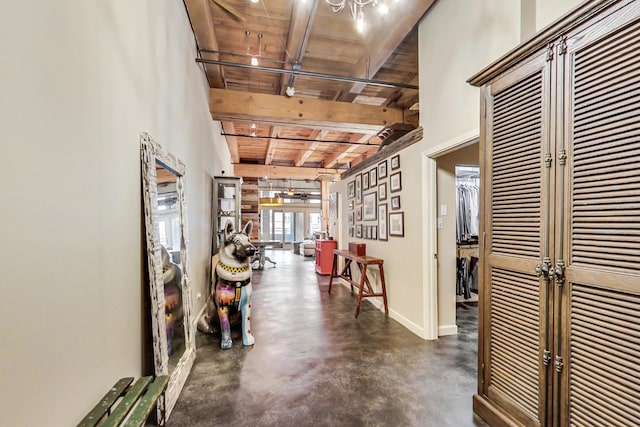 hallway with wood ceiling and beam ceiling