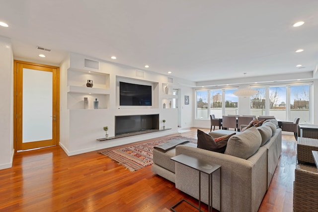 living room with wood-type flooring