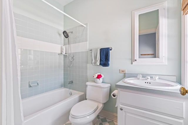 full bathroom featuring toilet, vanity, and shower / bath combo with shower curtain