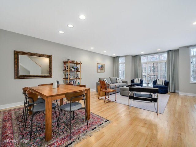 dining room with light wood-type flooring