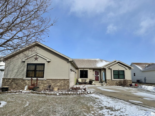 single story home featuring a garage