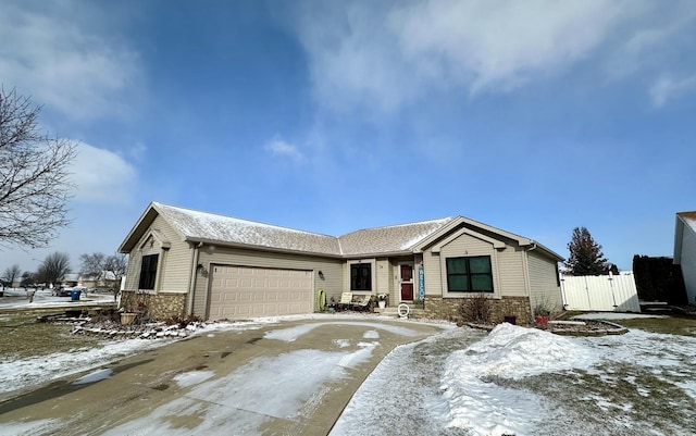 ranch-style house featuring a garage