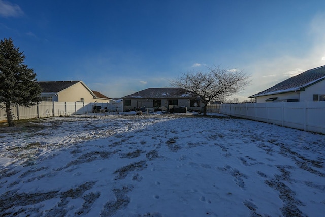 view of yard covered in snow