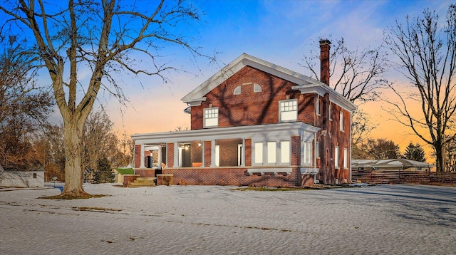 view of front of property featuring covered porch