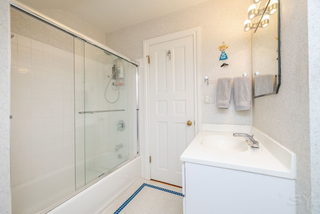 bathroom with tile patterned flooring, vanity, and enclosed tub / shower combo