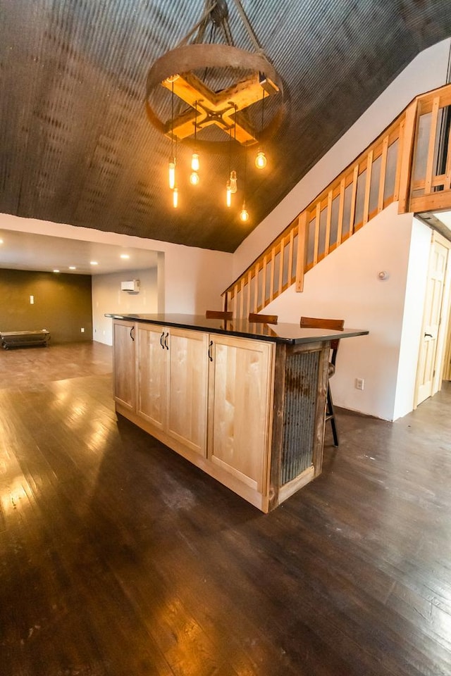 bar with dark wood-type flooring