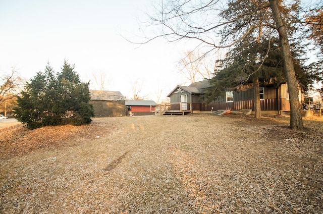 view of yard with a deck