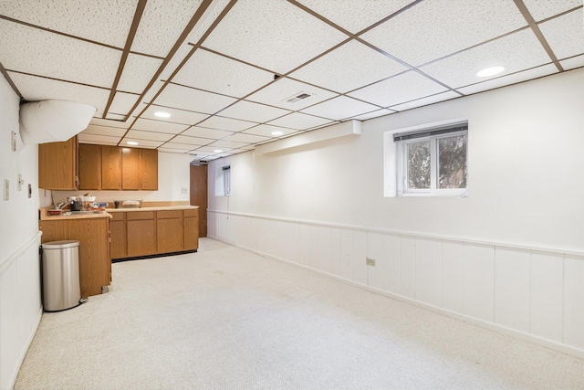 basement with light colored carpet