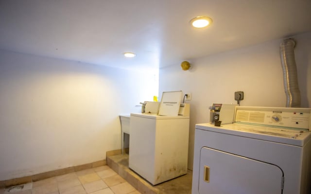 washroom with washer and clothes dryer