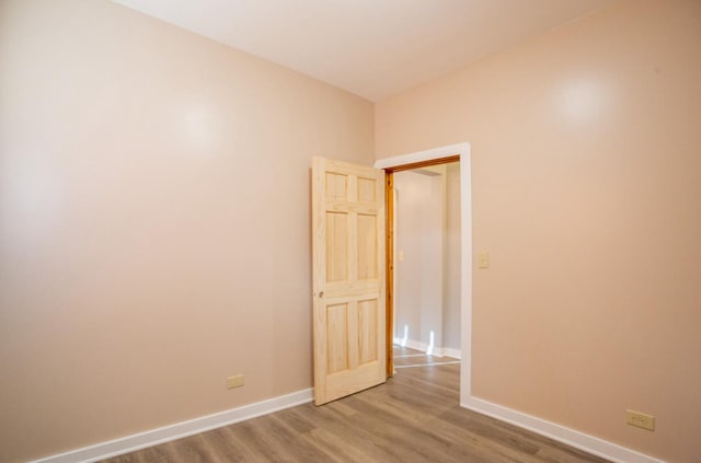 empty room featuring hardwood / wood-style floors