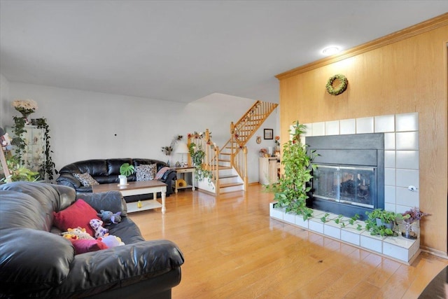 living room featuring a fireplace and light hardwood / wood-style floors