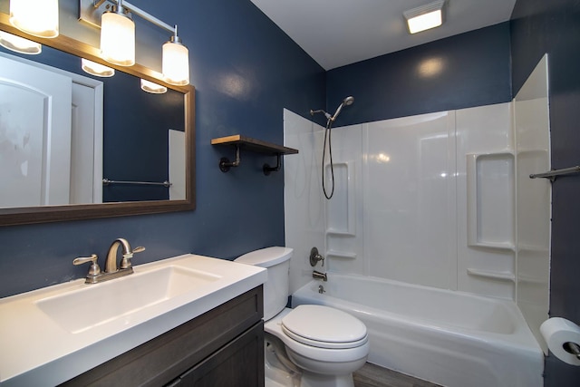 full bathroom featuring shower / tub combination, hardwood / wood-style floors, vanity, and toilet