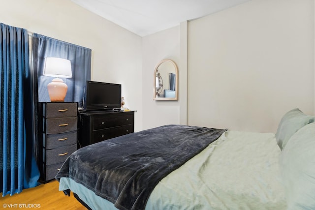 bedroom with light wood-type flooring