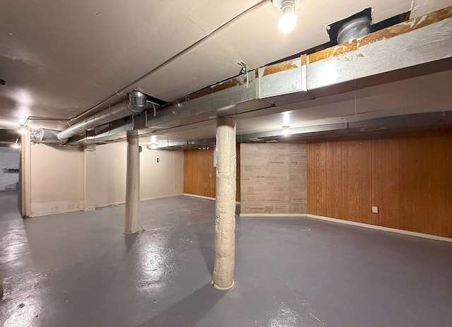 basement with wood walls