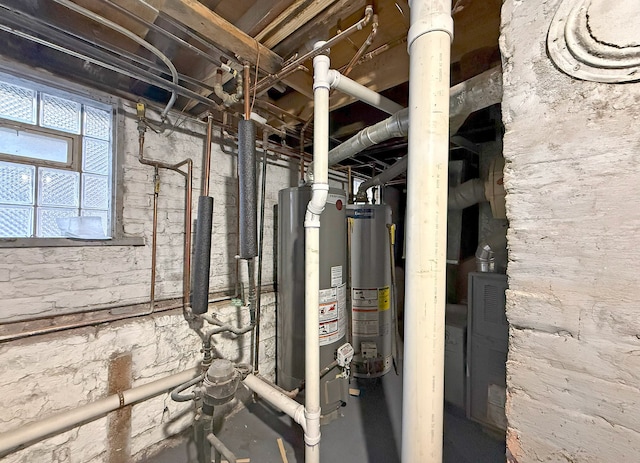 utility room featuring water heater