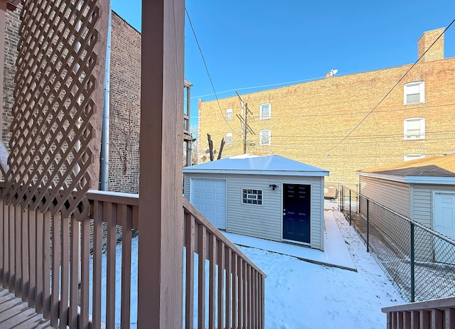 exterior space featuring an outbuilding and a garage