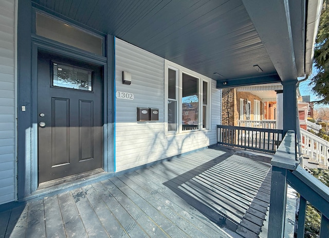 deck featuring covered porch