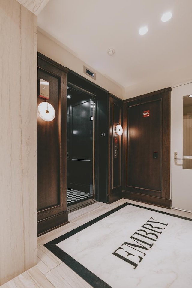 hallway featuring recessed lighting