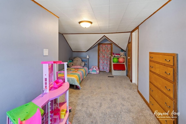 bedroom featuring light colored carpet and vaulted ceiling