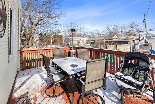 view of snow covered deck