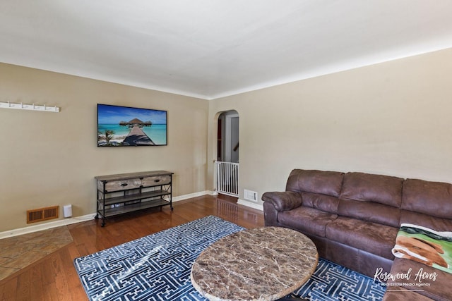 living room featuring dark hardwood / wood-style floors